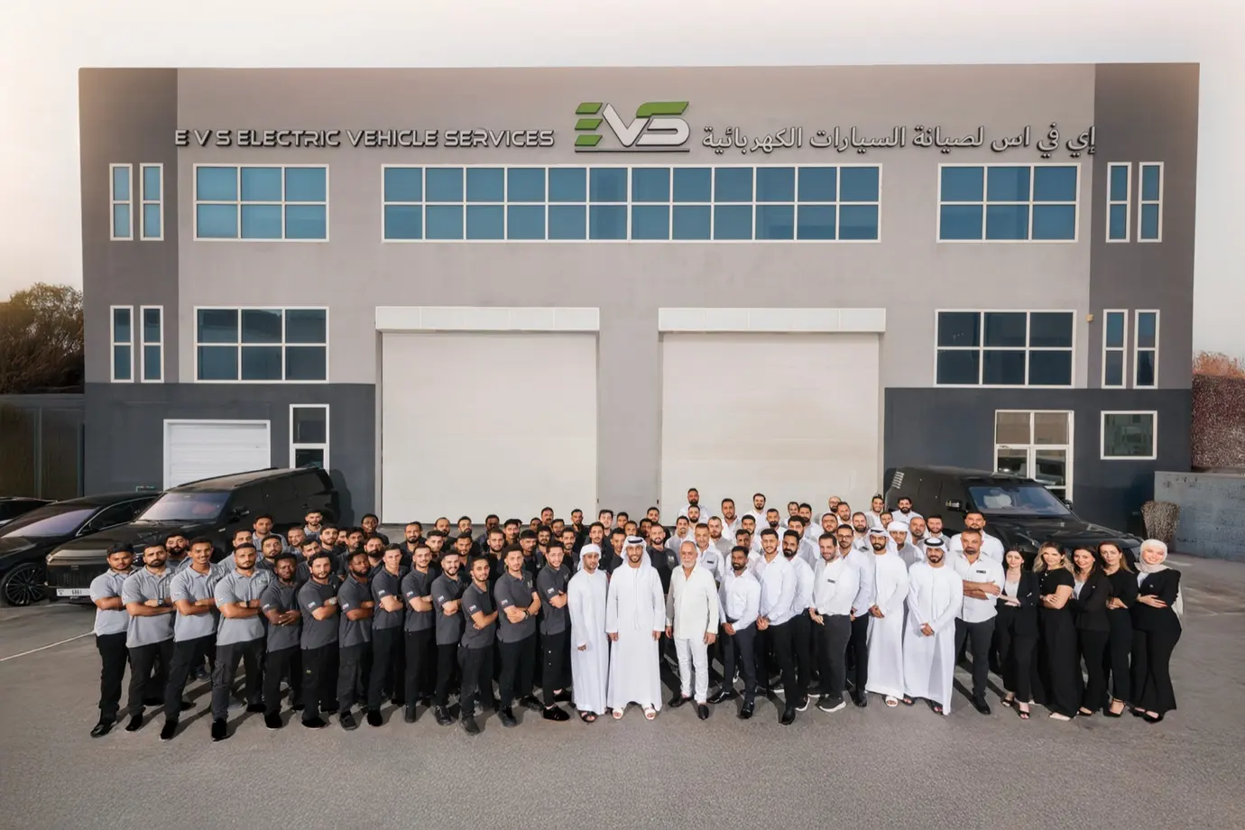The EVS team outside the workshop